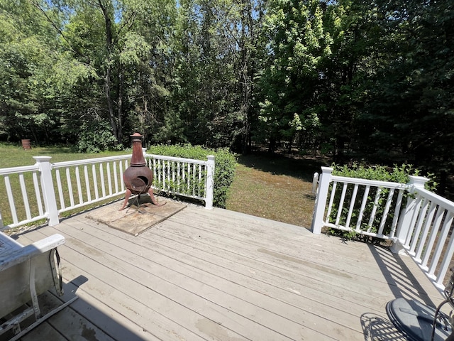 260 Treml, Michigan, MI 49411 - deck featuring a lawn