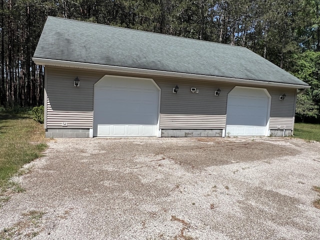 260 Treml, Michigan, MI 49411 - detached garage featuring view of scattered trees