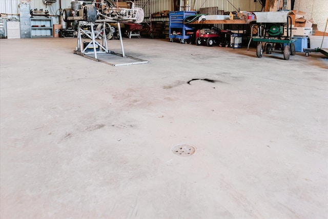 2098 Fisher Ct, Howell, MI 48855 - garage featuring a workshop area