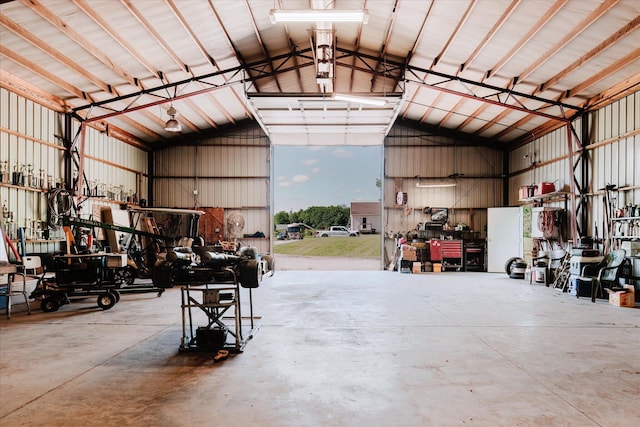 2098 Fisher Ct, Howell, MI 48855 - garage with a workshop area