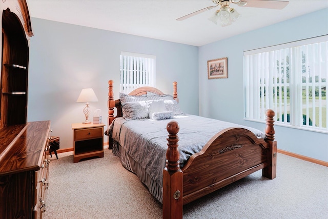 2098 Fisher Ct, Howell, MI 48855 - carpeted bedroom featuring baseboards and a ceiling fan