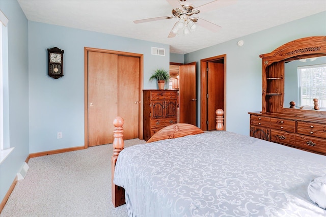 2098 Fisher Ct, Howell, MI 48855 - bedroom with carpet, a closet, and ceiling fan