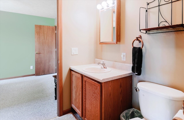 2098 Fisher Ct, Howell, MI 48855 - bathroom featuring toilet and vanity