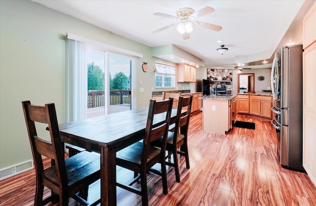 2098 Fisher Ct, Howell, MI 48855 - dining area featuring ceiling fan and light wood finished floors