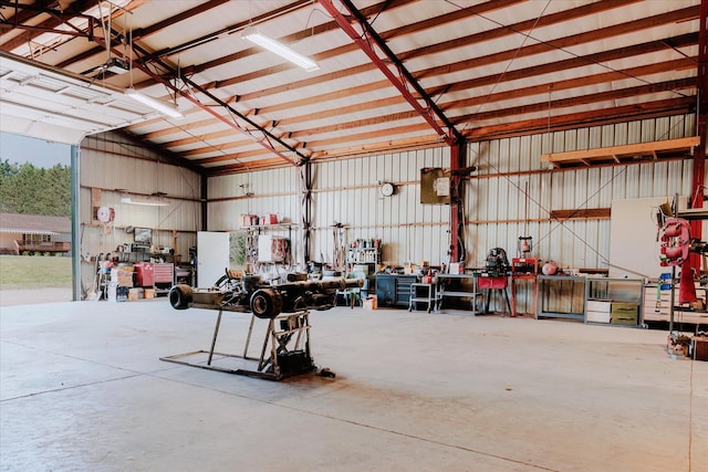 2098 Fisher Ct, Howell, MI 48855 - garage with a workshop area