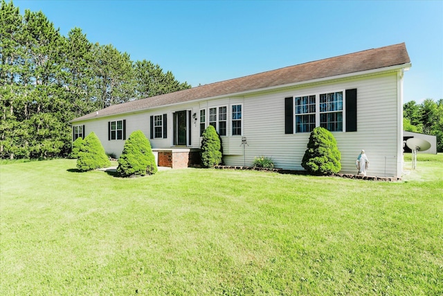 2098 Fisher Ct, Howell, MI 48855 - ranch-style house featuring a front lawn