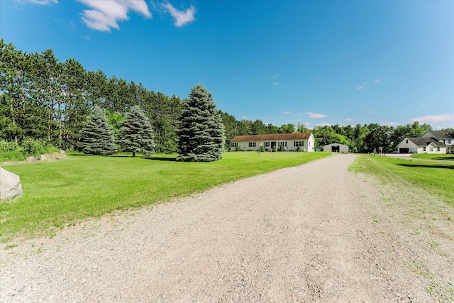 2098 Fisher Ct, Howell, MI 48855 - view of front of home featuring driveway and a front yard