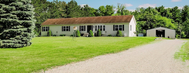 2098 Fisher Ct, Howell, MI 48855 - view of front of property featuring an outdoor structure, a front lawn, and driveway