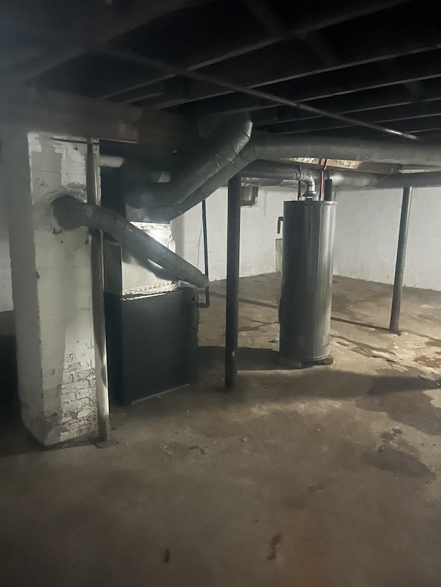 521 E Marengo Ave, Flint, MI 48505 - unfinished below grade area with water heater and heating unit
