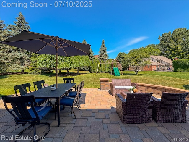 21653 Heatheridge Ln, Northville, MI 48167 - view of patio with outdoor dining space and a playground