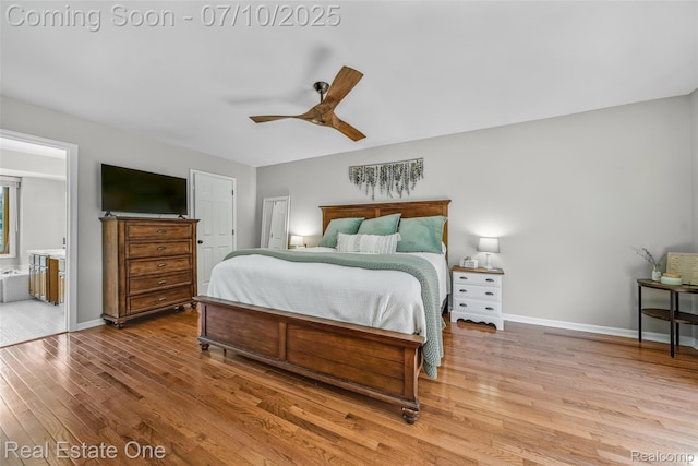 21653 Heatheridge Ln, Northville, MI 48167 - bedroom with wood finished floors, a ceiling fan, and ensuite bath