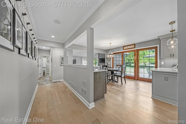21653 Heatheridge Ln, Northville, MI 48167 - corridor with light wood-type flooring, crown molding, and recessed lighting
