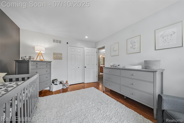21653 Heatheridge Ln, Northville, MI 48167 - bedroom with dark wood finished floors, recessed lighting, and a closet