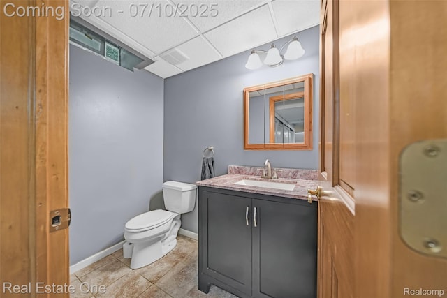 21653 Heatheridge Ln, Northville, MI 48167 - half bath featuring vanity, tile patterned floors, and a drop ceiling