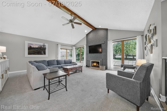 21653 Heatheridge Ln, Northville, MI 48167 - living room featuring light colored carpet, beamed ceiling, a fireplace, plenty of natural light, and high vaulted ceiling