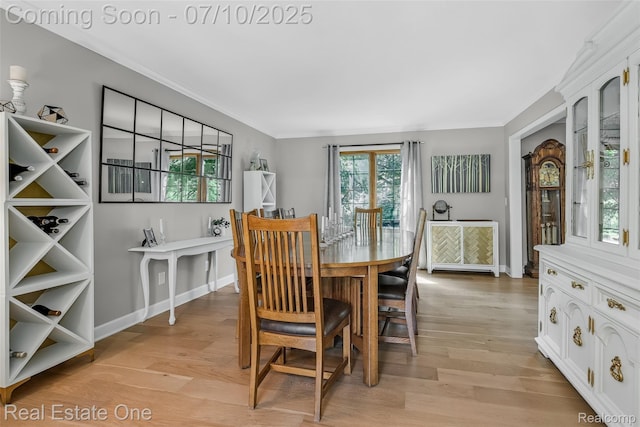 21653 Heatheridge Ln, Northville, MI 48167 - dining space with ornamental molding and light wood finished floors