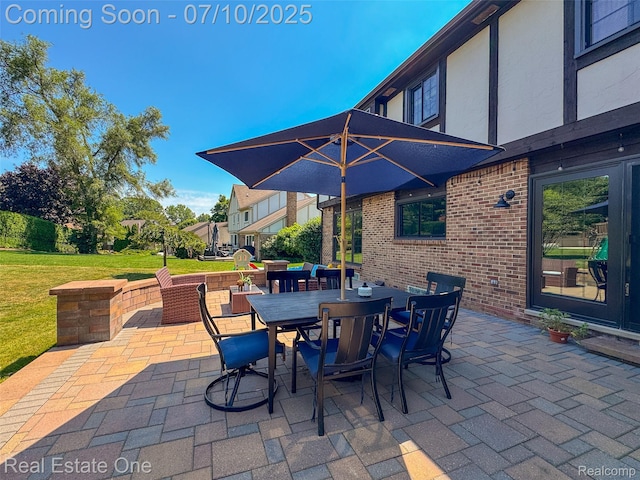 21653 Heatheridge Ln, Northville, MI 48167 - view of patio / terrace featuring outdoor dining area