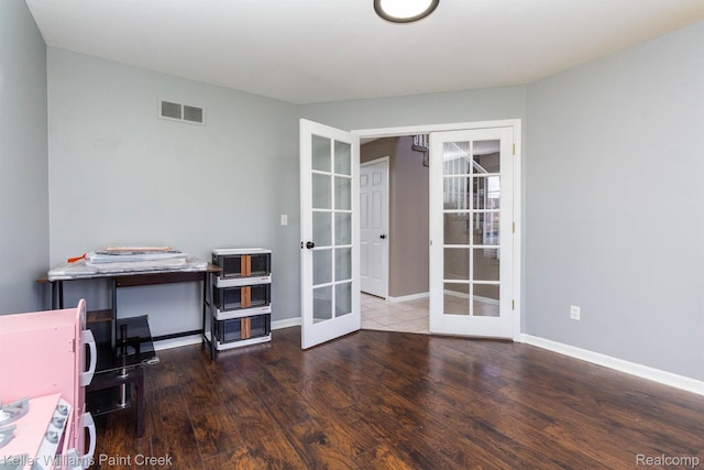 55856 Serene Dr, Macomb, MI 48042 - home office featuring french doors and wood finished floors