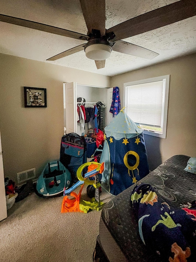 32013 Ottawa St, Westland, MI 48186 - bedroom featuring carpet, ceiling fan, and a textured ceiling