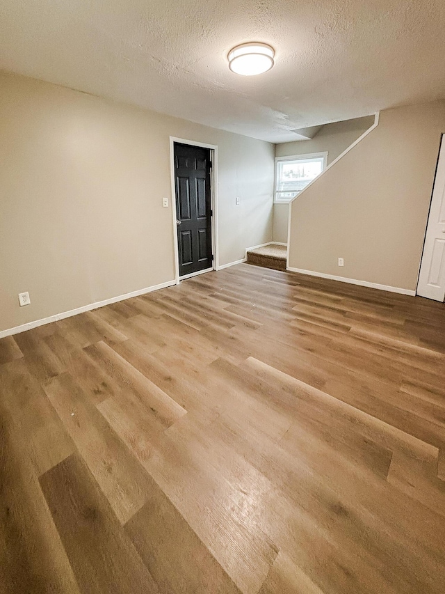 32013 Ottawa St, Westland, MI 48186 - unfurnished room featuring wood finished floors and a textured ceiling