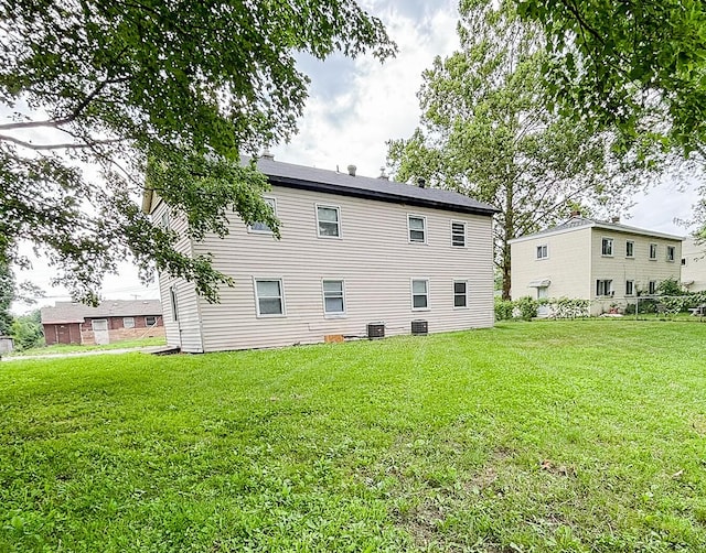 32013 Ottawa St, Westland, MI 48186 - rear view of property with a yard