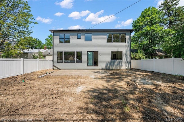 1978 Henrietta St, West Bloomfield, MI 48009 - rear view of house with a fenced backyard