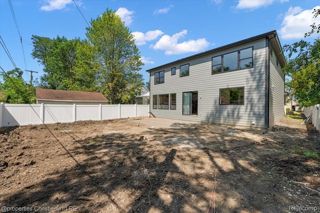 1978 Henrietta St, West Bloomfield, MI 48009 - rear view of house featuring a fenced backyard