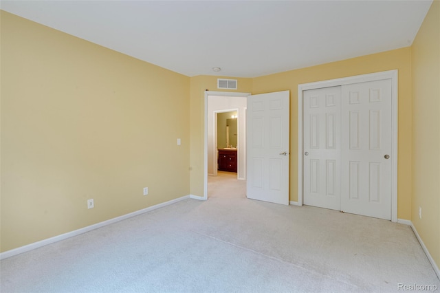 50042 Black Horse Ln, Canton, MI 48188 - unfurnished bedroom featuring light colored carpet and a closet