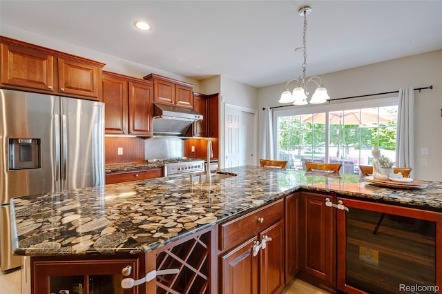 50042 Black Horse Ln, Canton, MI 48188 - kitchen with stainless steel fridge with ice dispenser, wine cooler, dark stone countertops, under cabinet range hood, and tasteful backsplash