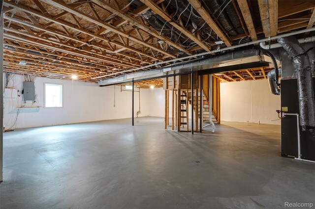 50042 Black Horse Ln, Canton, MI 48188 - basement with electric panel, stairs, and heating unit
