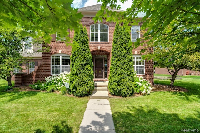 50042 Black Horse Ln, Canton, MI 48188 - view of front of house featuring a front yard and brick siding