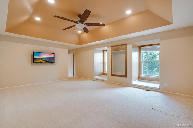 50042 Black Horse Ln, Canton, MI 48188 - unfurnished room with recessed lighting, a raised ceiling, light colored carpet, and a ceiling fan