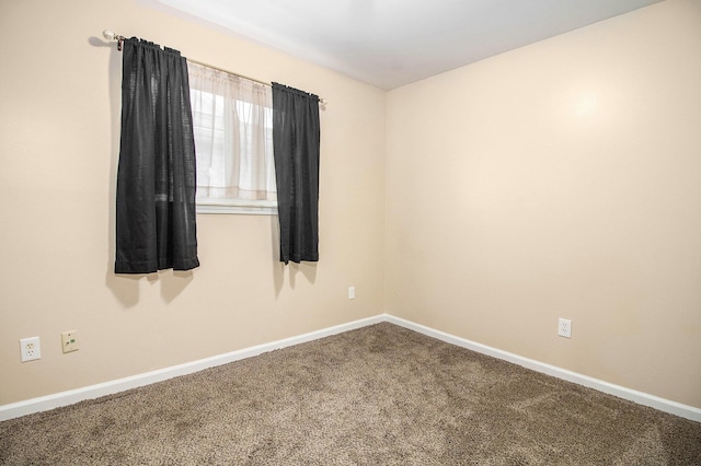 19263 Roger St, Melvindale, MI 48122 - carpeted empty room featuring baseboards