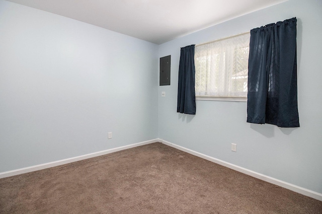 19263 Roger St, Melvindale, MI 48122 - carpeted empty room featuring electric panel and baseboards