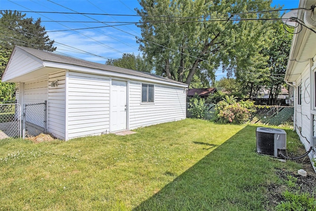 19263 Roger St, Melvindale, MI 48122 - view of yard featuring a garage and an outdoor structure