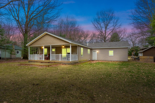 08311 W Shore Dr, Grand Junction, MI 49056 - view of front of house featuring a front yard and a porch