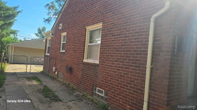 22784 N Kane, Detroit, MI 48223 - view of property exterior featuring brick siding and a gate