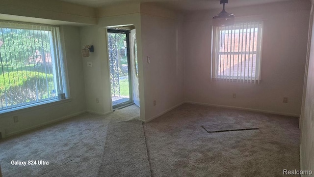 22784 N Kane, Detroit, MI 48223 - carpeted empty room featuring baseboards