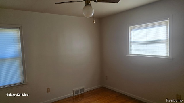 22784 N Kane, Detroit, MI 48223 - unfurnished room with ceiling fan and wood finished floors