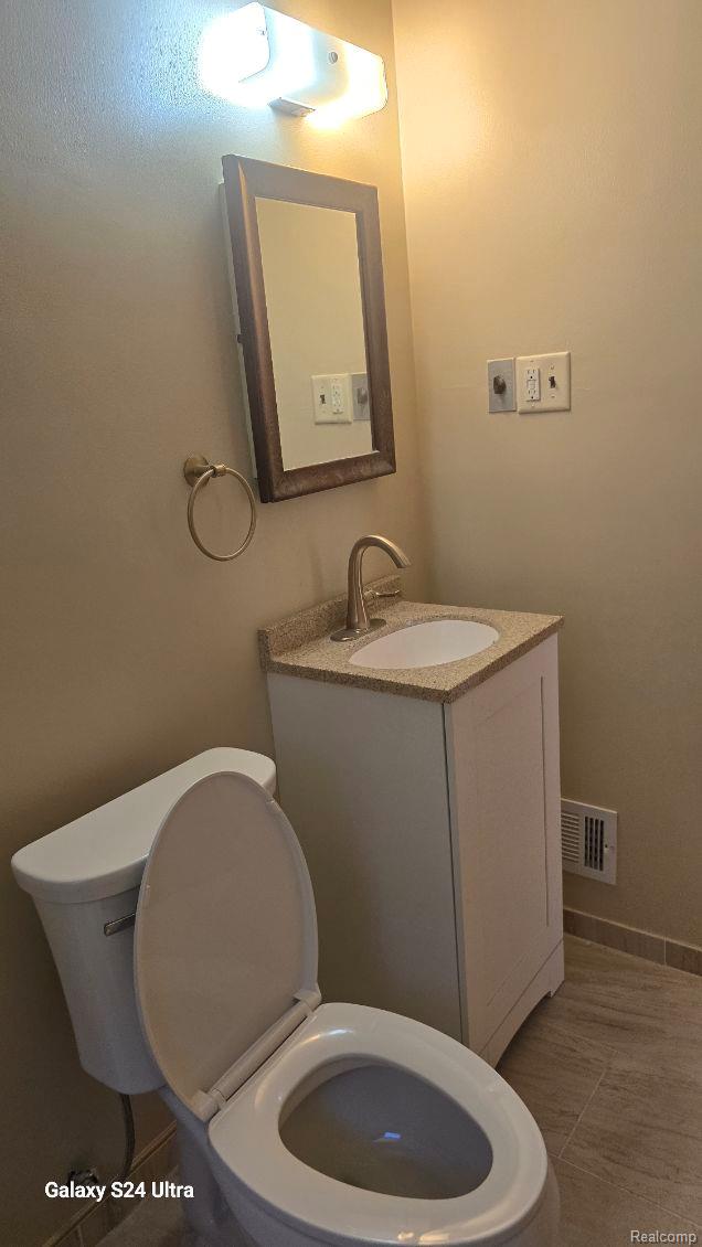 22784 N Kane, Detroit, MI 48223 - bathroom with toilet and vanity
