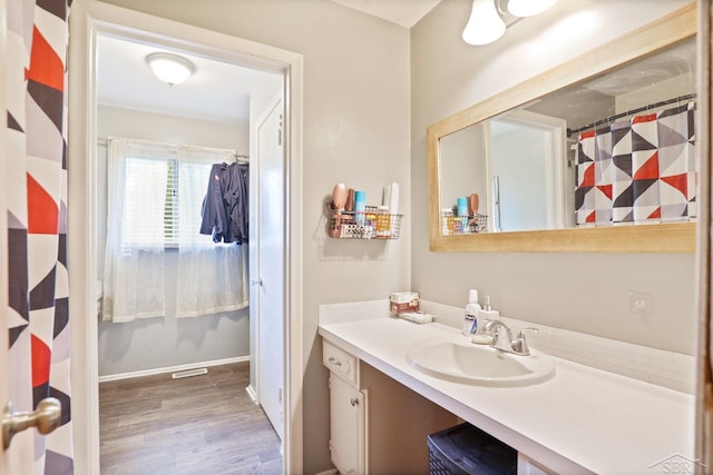 12821 Cimarron Dr, Birch Run, MI 48415 - full bath featuring vanity and wood finished floors