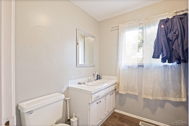 12821 Cimarron Dr, Birch Run, MI 48415 - bathroom featuring vanity and wood finished floors
