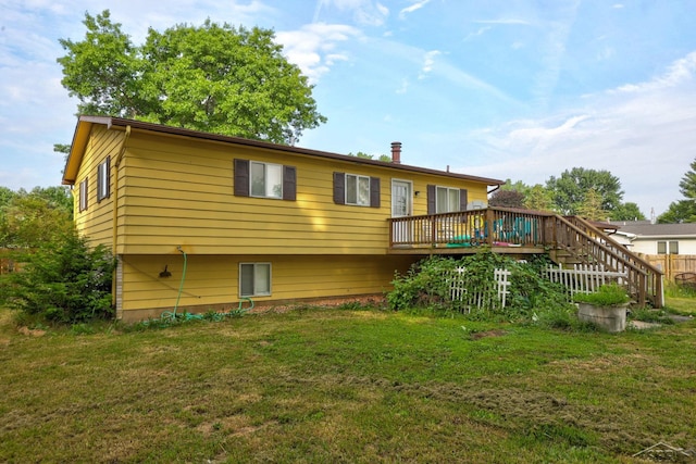 12821 Cimarron Dr, Birch Run, MI 48415 - rear view of house with a yard and a deck