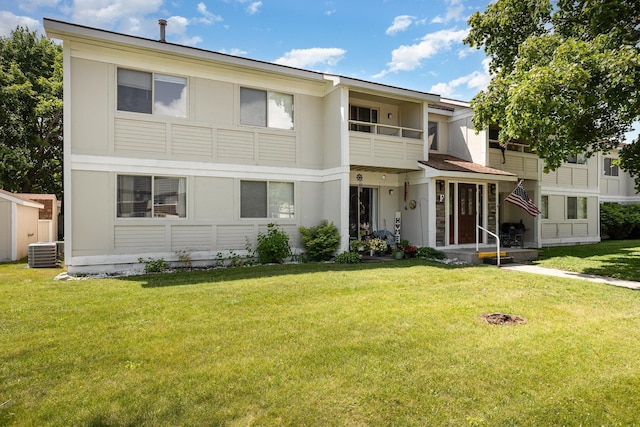 100 4th Ave, Tawas City, MI 48763 - view of front of property featuring a front lawn