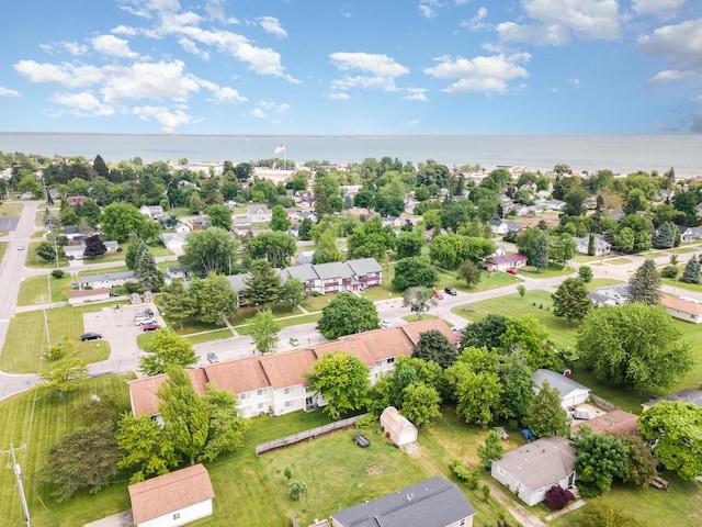 100 4th Ave, Tawas City, MI 48763 - aerial perspective of suburban area featuring a large body of water