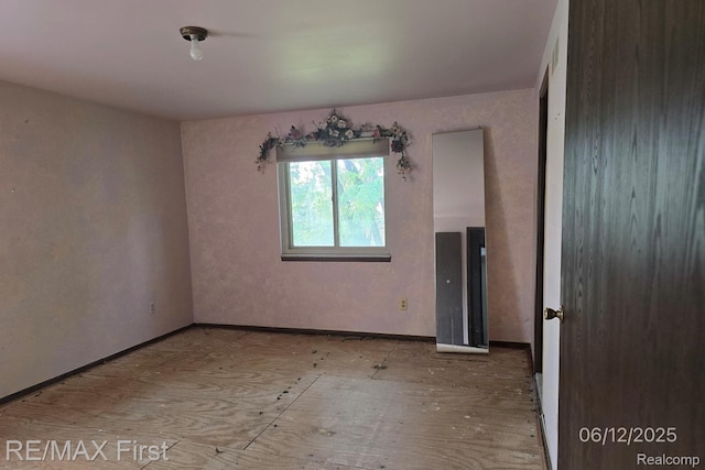39713 Chaffer, Clinton Township, MI 48038 - unfurnished room with baseboards