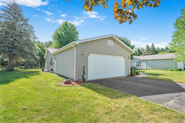 7900 Sunset Shores Dr, Canadian Lakes, MI 49346 - garage with asphalt driveway