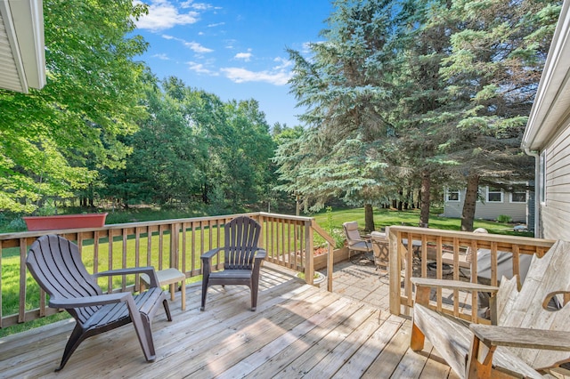 7900 Sunset Shores Dr, Canadian Lakes, MI 49346 - wooden terrace featuring a lawn and view of scattered trees