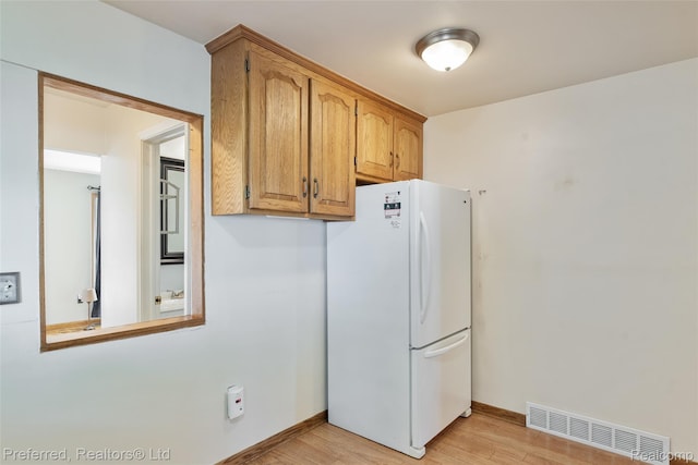839 Judith St, Westland, MI 48186 - kitchen with freestanding refrigerator and light wood-type flooring