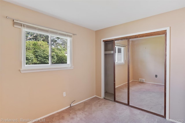 839 Judith St, Westland, MI 48186 - unfurnished bedroom featuring multiple windows, carpet floors, and a closet